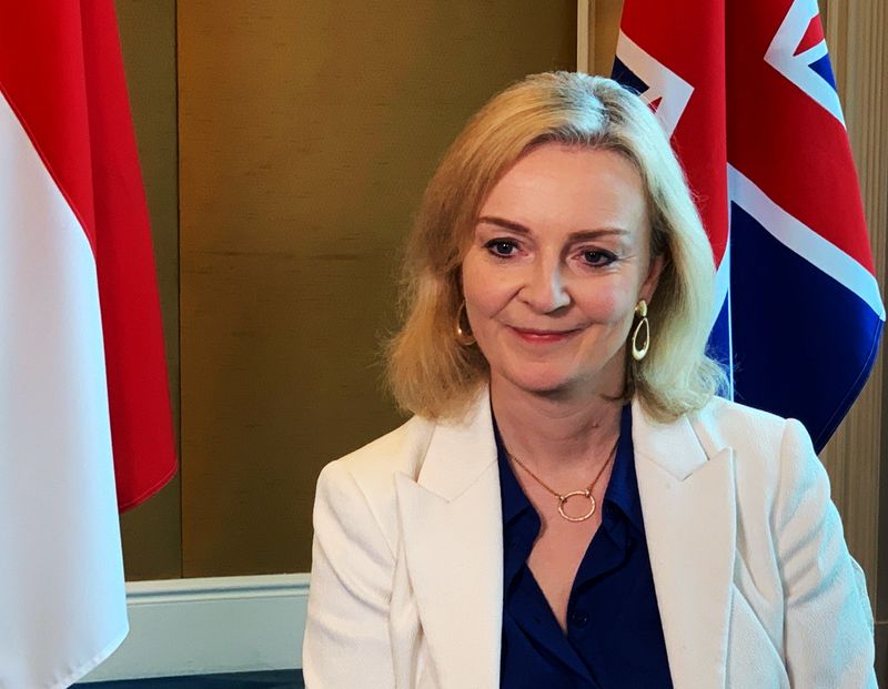 British trade minister Liz Truss speaks to Reuters after signing