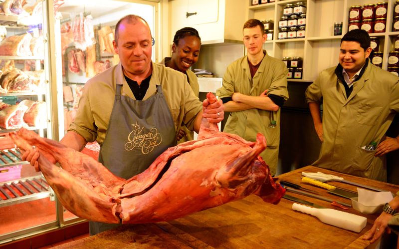 FILE PHOTO: Perry Bartlet teaches how to butcher lamb during