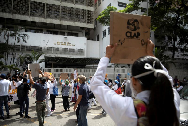FILE PHOTO: Healthcare workers protest against low wages in Caracas