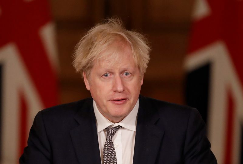 Britain’s Prime Minister Boris Johnson holds a news conference about