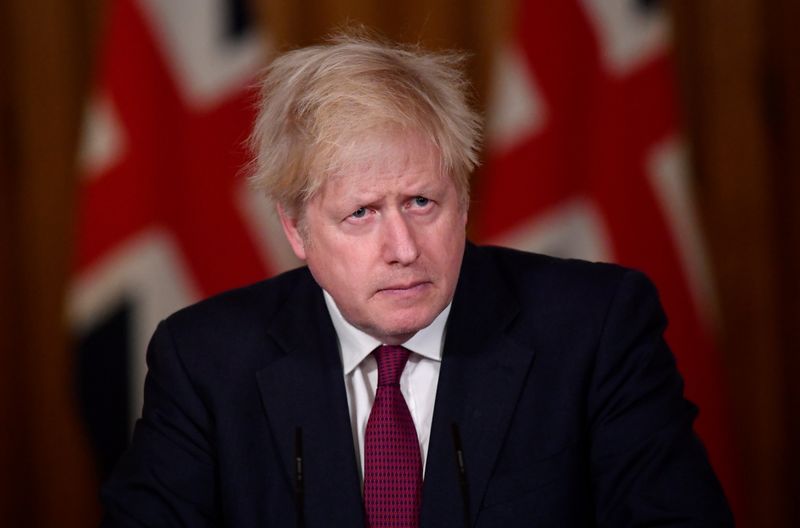 Britain’s Prime Minister Boris Johnson holds a news conference in