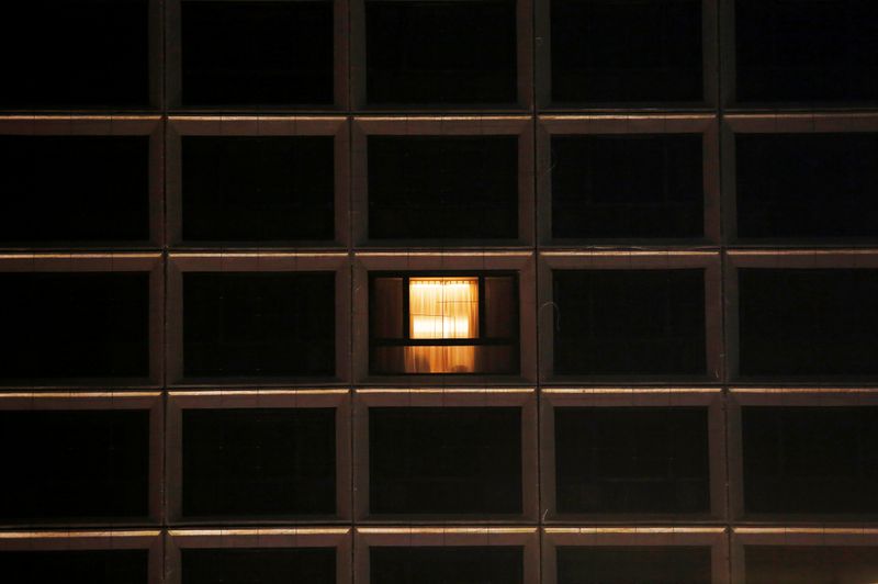 FILE PHOTO: A window with lights on is seen at