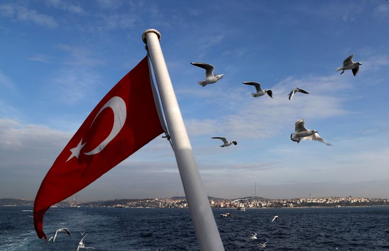 A Turkish flag flies on a passenger ferry in Istanbul