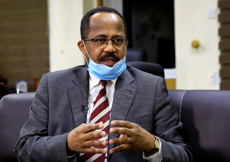 Sudan’s Minister of Health Akram Ali Altom speaks during a