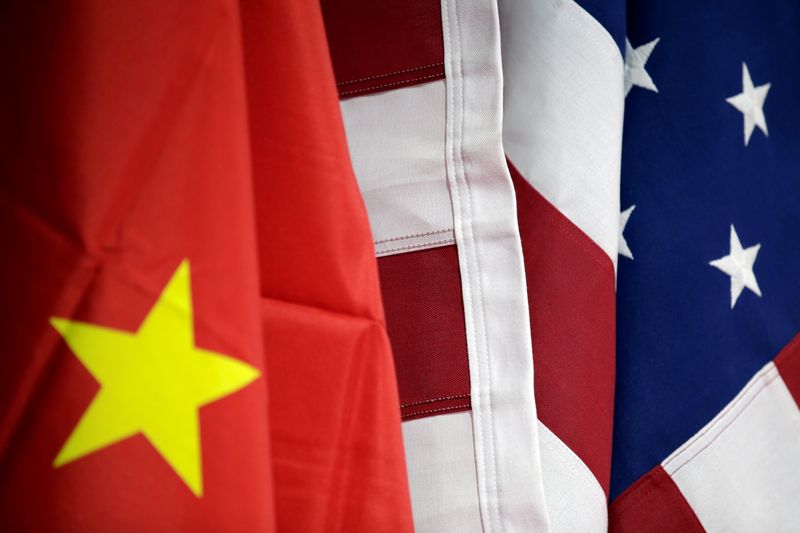 FILE PHOTO:  Flags of U.S. and China are displayed