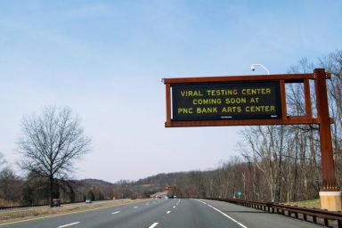 Roadside screen gives information about testing center for coronavirus disease