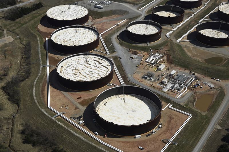 FILE PHOTO: Crude oil storage tanks seen from above at