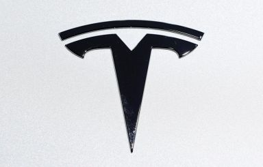 Tesla logo is pictured on an electric car at Brussels