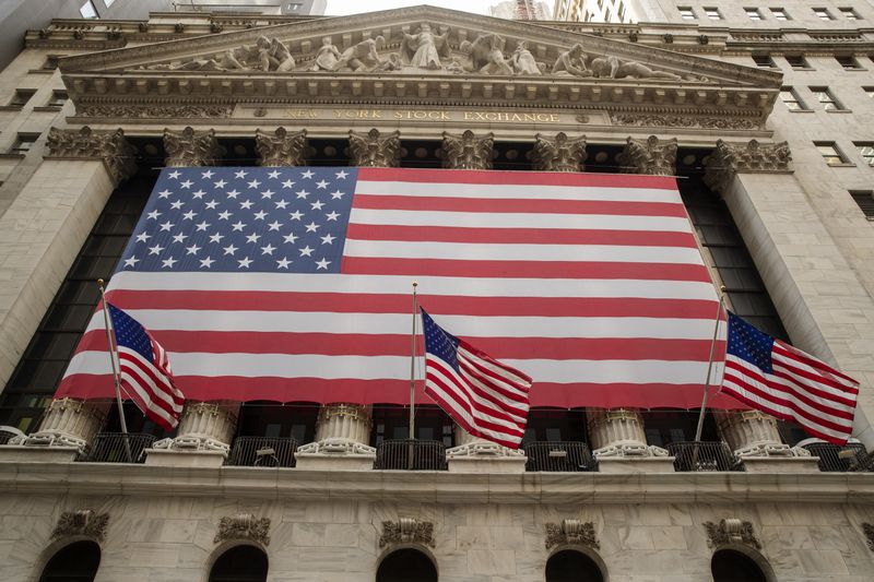United States flags fly outside of the NYSE as markets