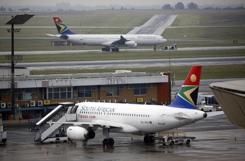 FILE PHOTO: South African Airways (SAA) plane is towed at