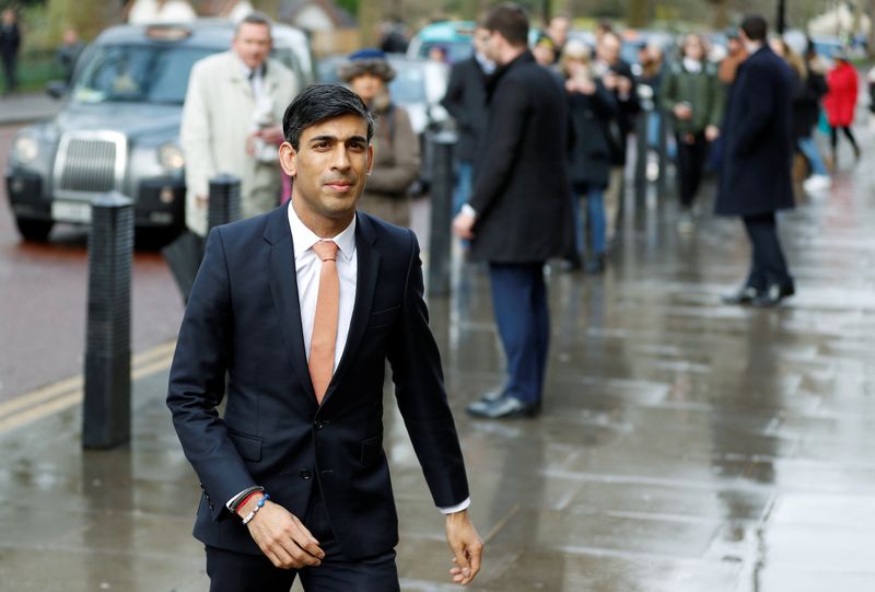 Newly appointed Britain’s Chancellor of the Exchequer Rishi Sunak arrives
