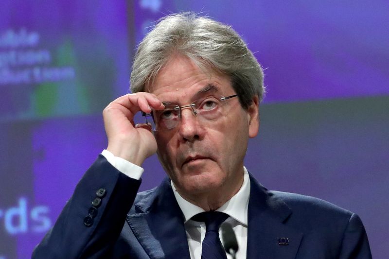 EU Economy Commissioner Paolo Gentiloni gives a news conference on