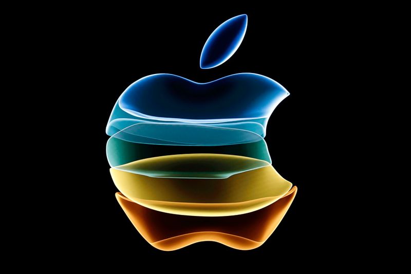 The Apple logo is displayed at an event at their