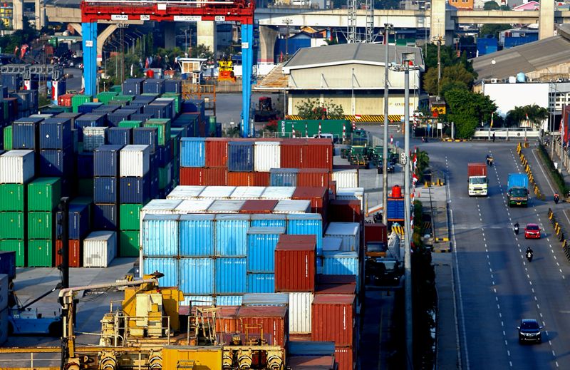 Stacks of containers are seen at Tanjung Priok port amid