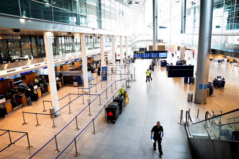 Copenhagen Airport’s Terminal 3 hall is seen almost empty following