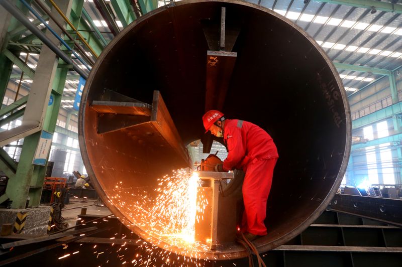 Man works at a production base of CSCEC Steel in