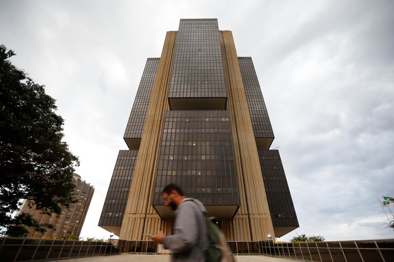 A man walks in front the Central bank headquarters building