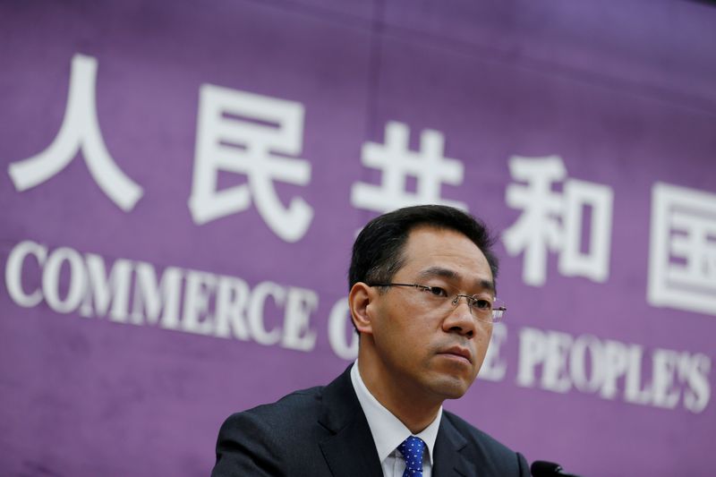 China’s Ministry of Commerce spokesperson Gao Feng attends a news