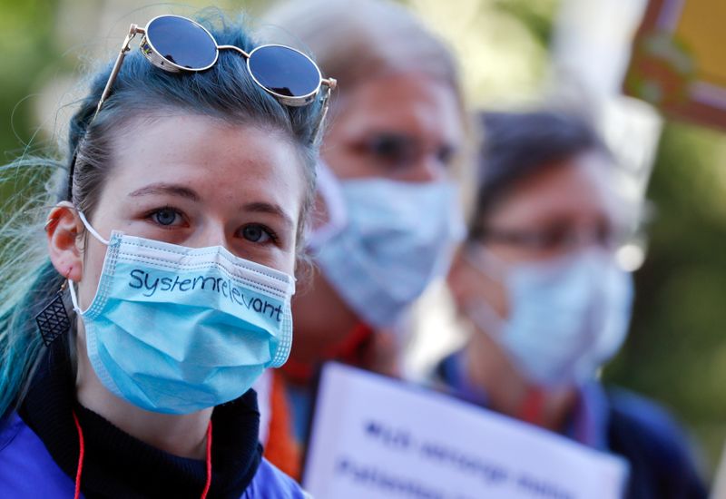 FILE PHOTO: German nurses and nursing staff demonstrate for higher