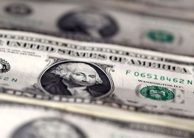 FILE PHOTO: FILE PHOTO: U.S. dollar notes are seen in