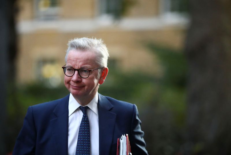 Britain’s Chancellor of the Duchy of Lancaster Michael Gove walks