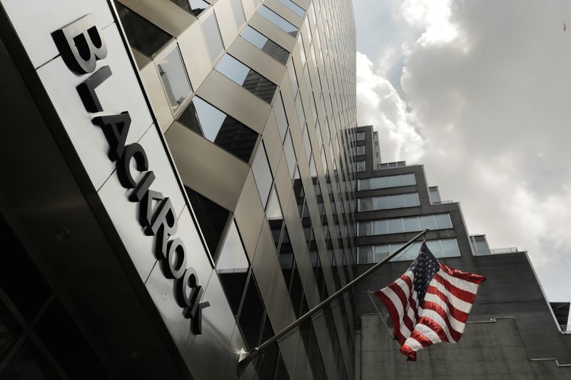 A sign for BlackRock Inc hangs above their building in