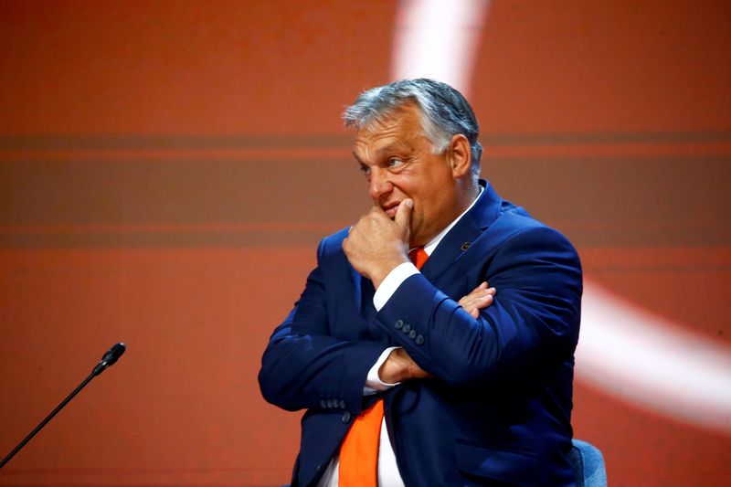 FILE PHOTO: Hungarian Prime Minister Viktor Orban reacts at Bled