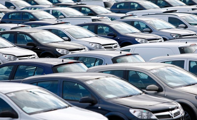 File photograph shows new Vauxhall cars standing outside the company’s
