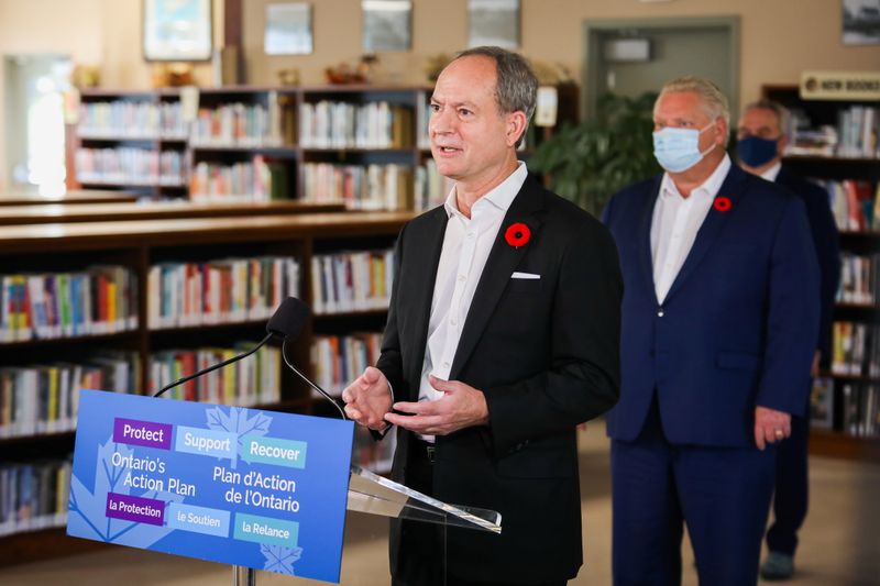 Peter Bethlenfalvy attends an event with Premier Doug Ford in