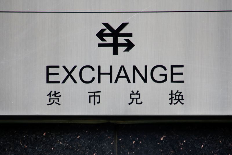 A sign for foreign currency exchange is seen at a
