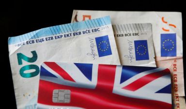 A Union Jack themed Visa credit card is seen amongst