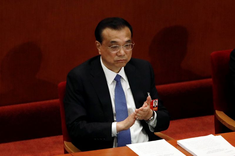 Chinese Premier Li Keqiang attends the closing session of NPC