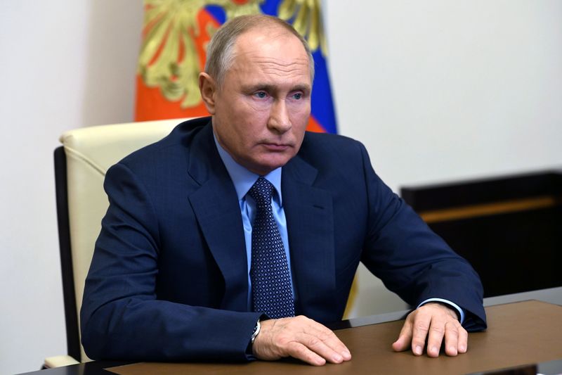 Russian President Putin takes part in a video conference call