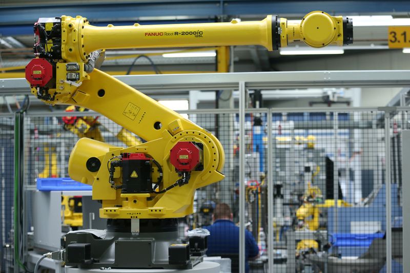 A Fanuc R-2000iC industrial robot is seen at HAHN Automation