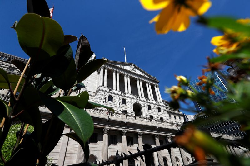 Flowers in bloom are sen opposite the Bank of England,