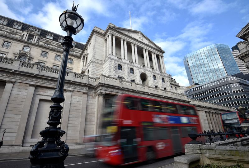 A bus passes the Bank of England in the City