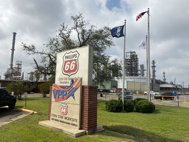 FILE PHOTO: Flags wave in front of the Phillips 66