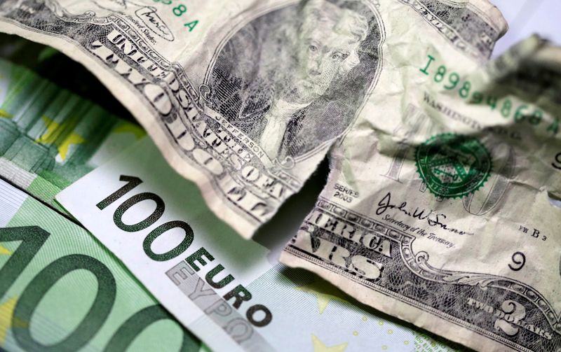 FILE PHOTO: U.S. dollar and euro banknotes are seen in