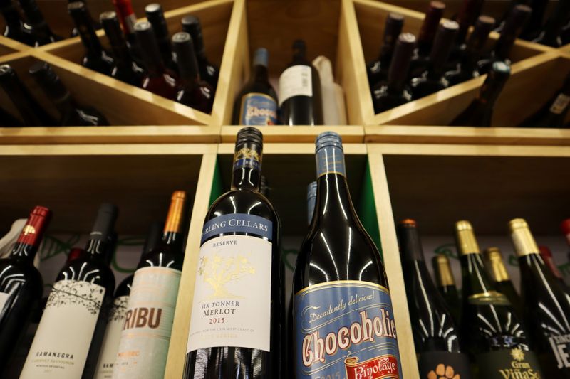 Bottles of South African wine are displayed among others at