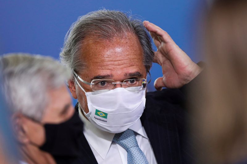 FILE PHOTO: Brazil’s Economy Minister Paulo Guedes reacts before a