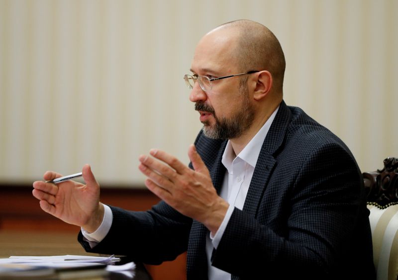 FILE PHOTO: Ukraine’s Prime Minister Shmygal speaks during an interview