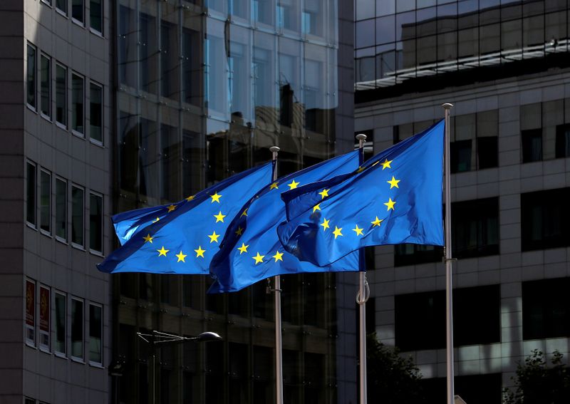 FILE PHOTO: FILE PHOTO: European Union flags flutter outside the