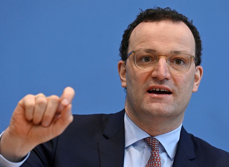 FILE PHOTO: German Health Minister Jens Spahn holds a news