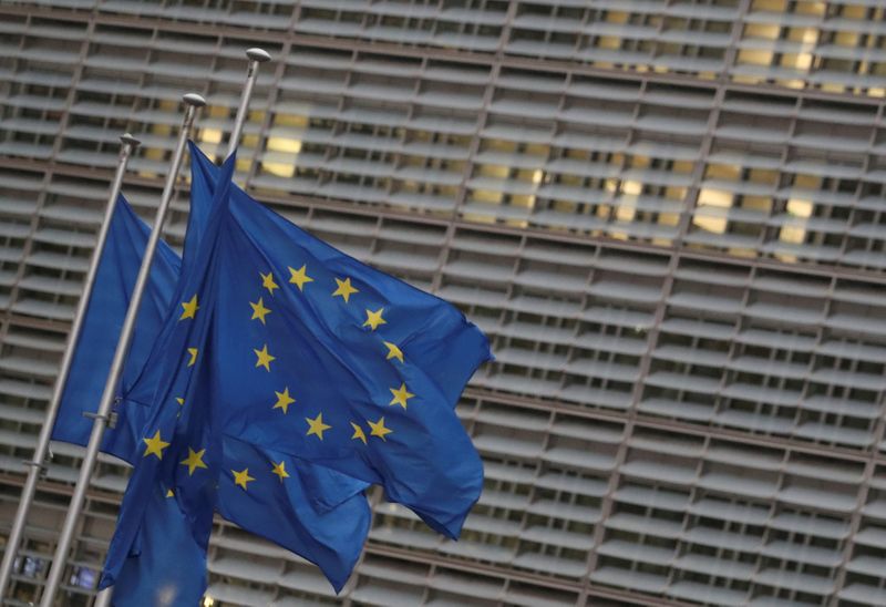 FILE PHOTO: EU flags flutter outside the European Commission headquarters