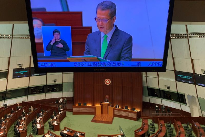 Hong Kong’s Finance Secretary Paul Chan delivers the annual budget