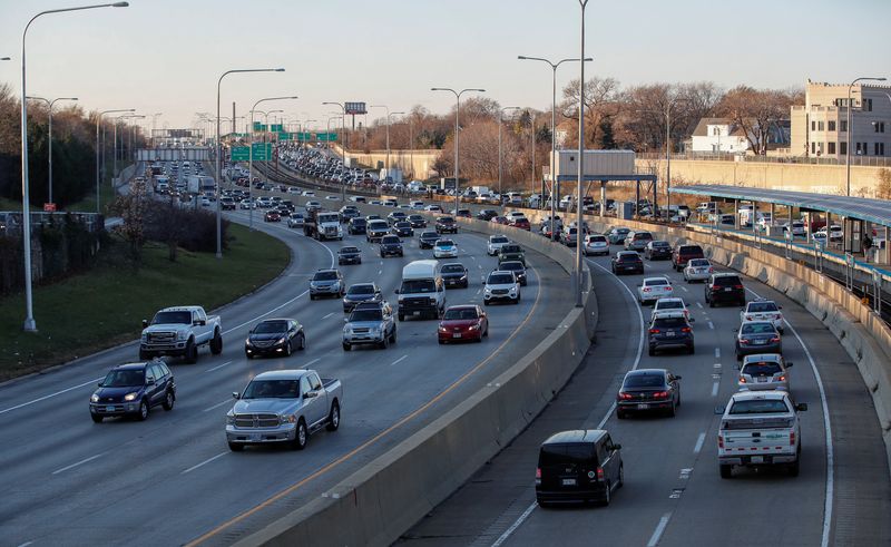 Cars fill the road as people travel before the Thanksgiving