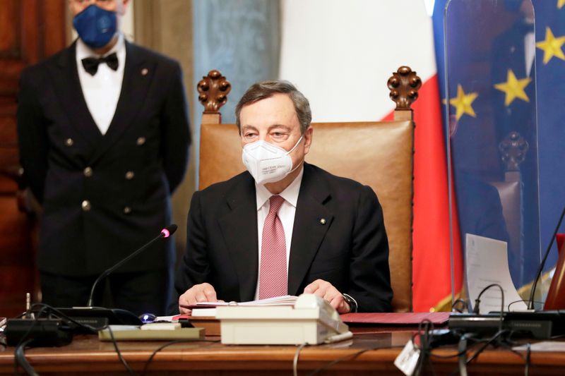 FILE PHOTO: Prime Minister designate Draghi and his new government