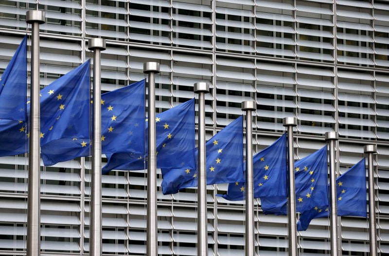 FILE PHOTO: Picture shows European Union flags fluttering outside the