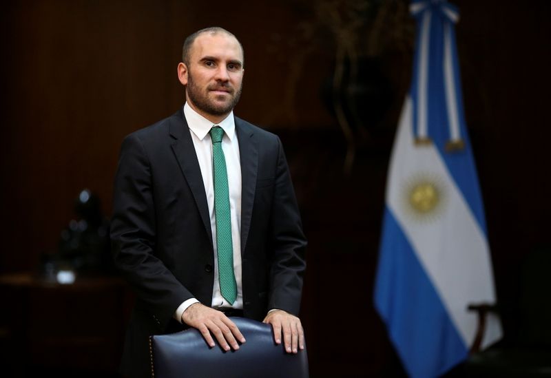 Argentina’s Economy Minister Martin Guzman poses for a picture before