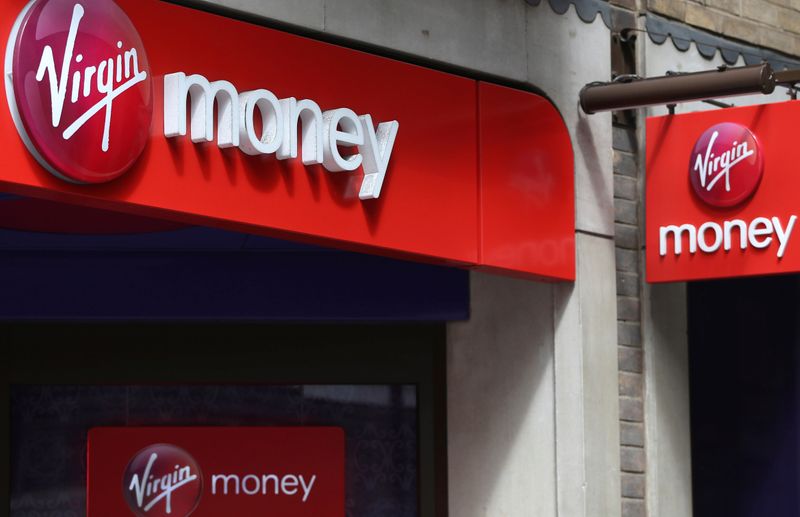 FILE PHOTO: Signs are displayed on a Virgin Money store
